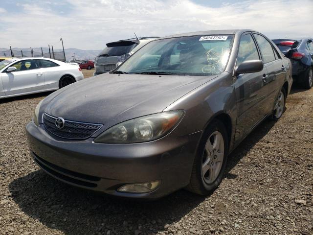 Photo 2 from auction – 2002 TOYOTA CAMRY LE with VIN JTDBE30K920042232