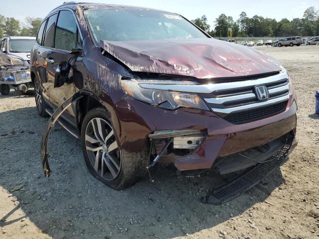 HONDA PILOT TOUR 2016 with VIN 5FNYF5H92GB051240 - Photo from auction