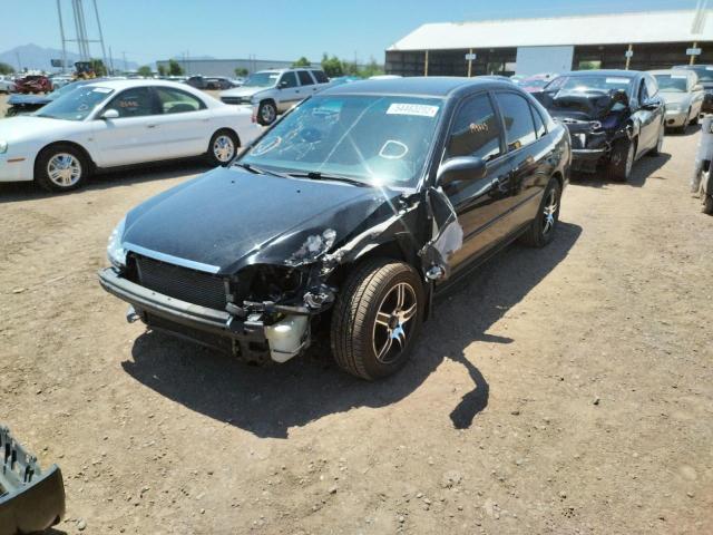 Photo 2 from auction – 2003 HONDA CIVIC LX with VIN 2HGES16543H550697