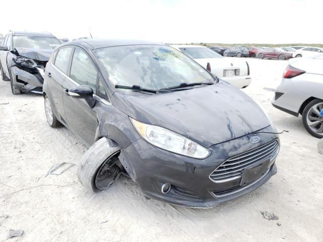 FORD FIESTA TIT 2014 with VIN 3FADP4FJ4EM204198 - Photo from auction