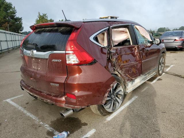 Photo 4 from auction – 2016 HONDA CR-V TOURI with VIN 5J6RM4H94GL030773