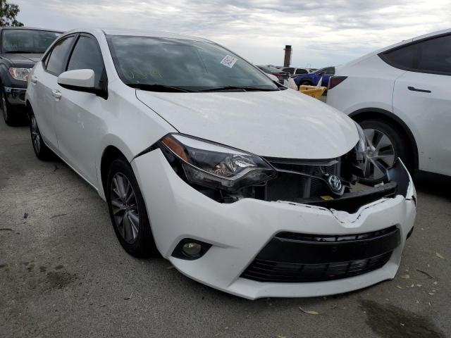 TOYOTA COROLLA L 2015 with VIN 5YFBURHE1FP238584 - Photo from auction
