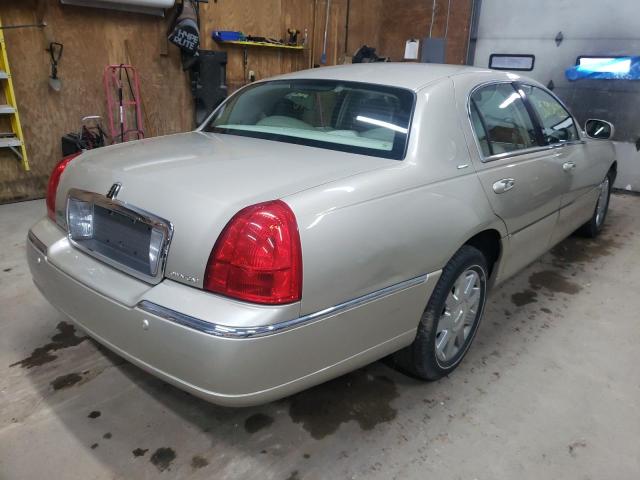 Photo 4 from auction – 2004 LINCOLN TOWN CAR U with VIN 1LNHM83W34Y678525