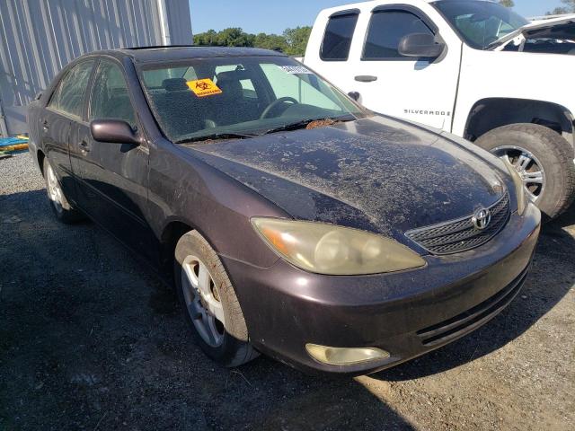 TOYOTA CAMRY LE 2002 with VIN 4T1BF30KX2U511412 - Photo from auction