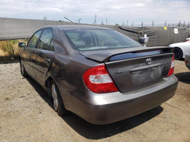 Photo 3 from auction – 2002 TOYOTA CAMRY LE with VIN JTDBE30K920042232