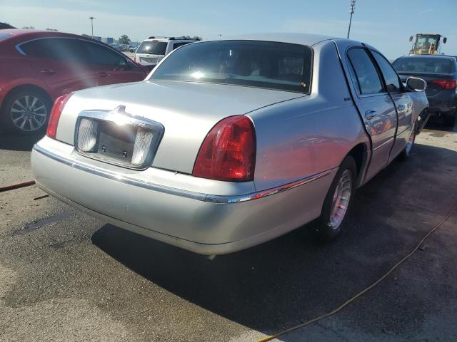 Photo 4 from auction – 1998 LINCOLN TOWN CAR E with VIN 1LNFM81W9WY706728