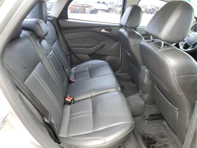 Foto 6 de la subasta – 2013 FORD FOCUS SE con VIN 1FADP3F22DL106810