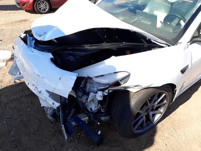 Photo 10 from auction – 2021 TESLA MODEL 3 with VIN 5YJ3E1EA0MF073494