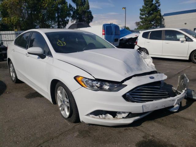FORD FUSION SE 2018 with VIN 3FA6P0HD9JR158843 - Photo from auction