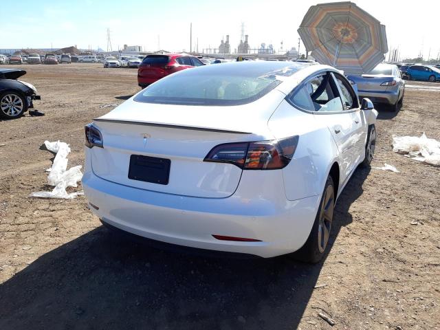 Photo 4 from auction – 2021 TESLA MODEL 3 with VIN 5YJ3E1EA0MF073494