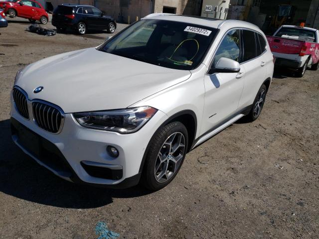 Photo 2 from auction – 2017 BMW X1 XDRIVE2 with VIN WBXHT3C37H5F74424