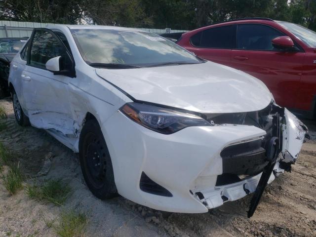 TOYOTA COROLLA L 2019 with VIN 5YFBURHE8KP887759 - Photo from auction
