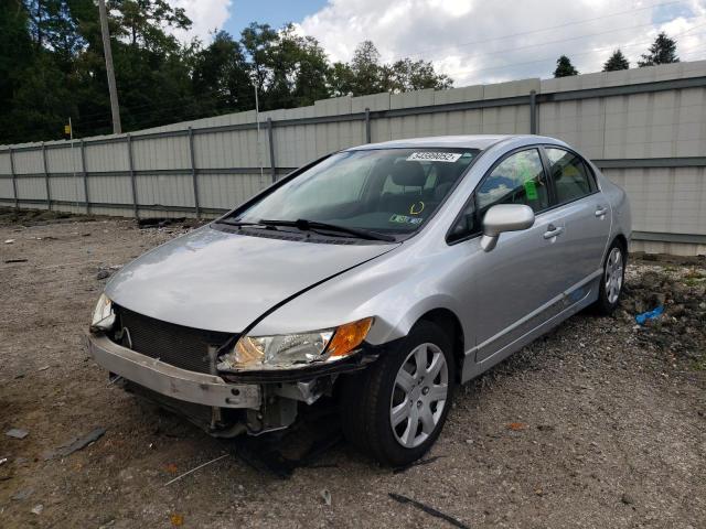 Photo 2 from auction – 2011 HONDA CIVIC LX with VIN 2HGFA1F54BH534649
