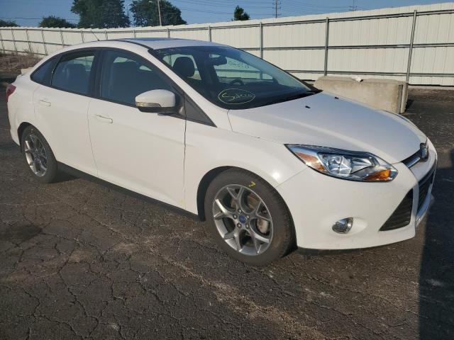 FORD FOCUS SE 2014 with VIN 1FADP3F29EL431133 - Photo from auction