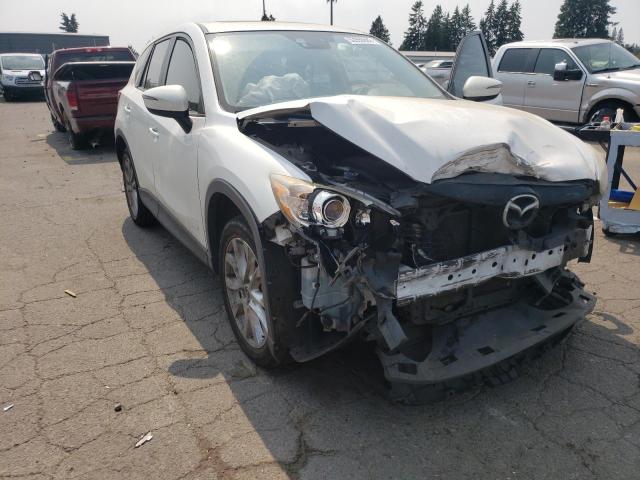 MAZDA CX-5 GT 2015 with VIN JM3KE4DY7F0544898 - Photo from auction