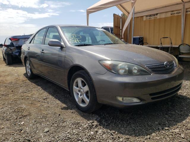 TOYOTA CAMRY LE 2002 with VIN JTDBE30K920042232 - Photo from auction