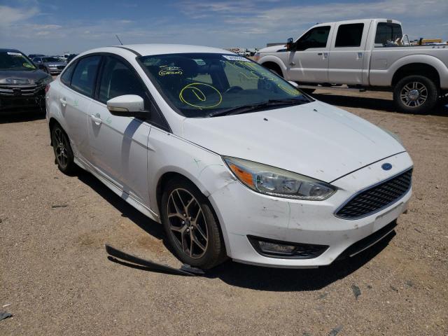 FORD FOCUS SE 2015 with VIN 1FADP3F29FL273409 - Photo from auction