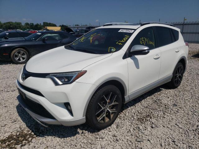 Photo 2 from auction – 2016 TOYOTA RAV4 SE with VIN JTMJFREV9GD183185