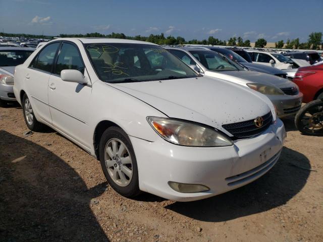 TOYOTA CAMRY LE 2004 with VIN 4T1BF30K54U075491 - Photo from auction