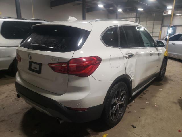 Photo 4 from auction – 2017 BMW X1 XDRIVE2 with VIN WBXHT3C30H5F75852
