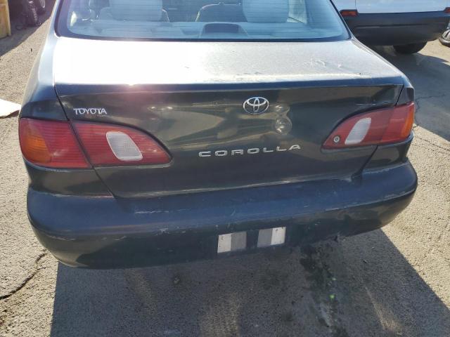 Photo 9 from auction – 1999 TOYOTA COROLLA VE with VIN 2T1BR12E4XC219993
