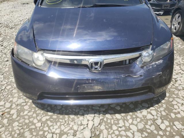 Photo 9 from auction – 2007 HONDA CIVIC LX with VIN 1HGFA16557L010145