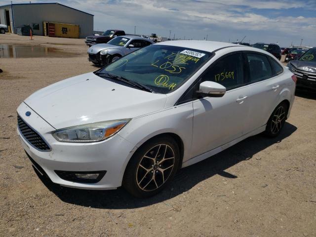 Photo 2 from auction – 2015 FORD FOCUS SE with VIN 1FADP3F29FL273409