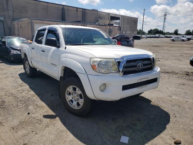 TOYOTA TACCOMA 2009 with VIN 3TMLU42N99M030674 - Photo from auction