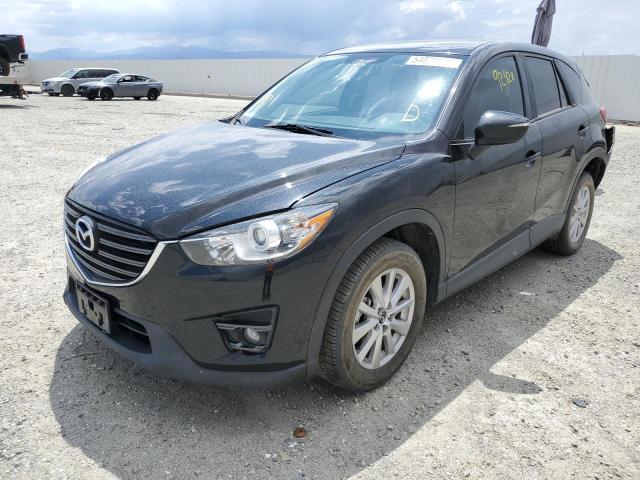 Photo 2 from auction – 2016 MAZDA CX-5 with VIN JM3KE2CYXG0849075