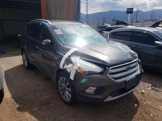 FORD ESCAPE TIT 2017 with VIN 1FMCU9J98HUB03878 - Photo from auction