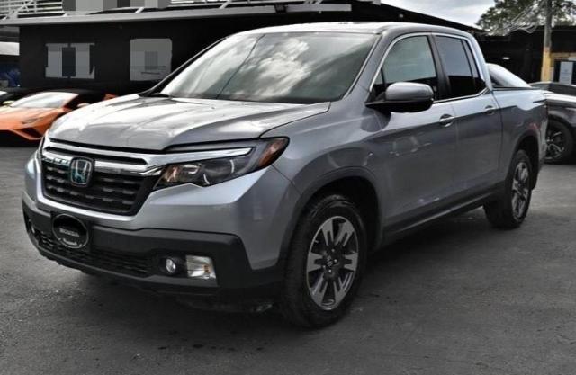 Photo 2 from auction – 2019 HONDA RIDGELINE with VIN 5FPYK2F50KB002080