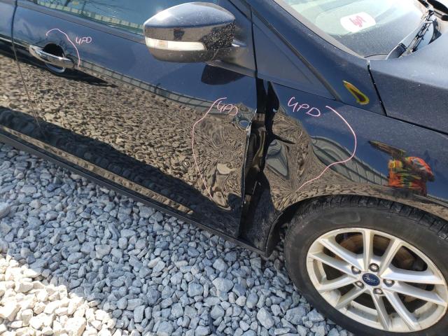 Photo 9 from auction – 2016 FORD FOCUS SE with VIN 1FADP3F2XGL383595