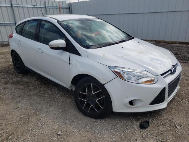 FORD FOCUS SE 2014 with VIN 1FADP3K21EL338127 - Photo from auction