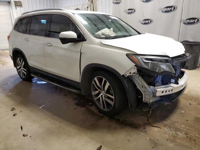 HONDA PILOT TOUR 2016 with VIN 5FNYF5H94GB060280 - Photo from auction