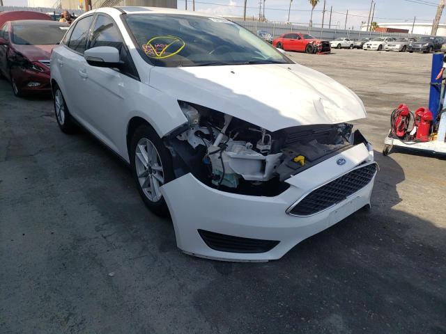 FORD FOCUS SE 2017 with VIN 1FADP3F2XHL334480 - Photo from auction