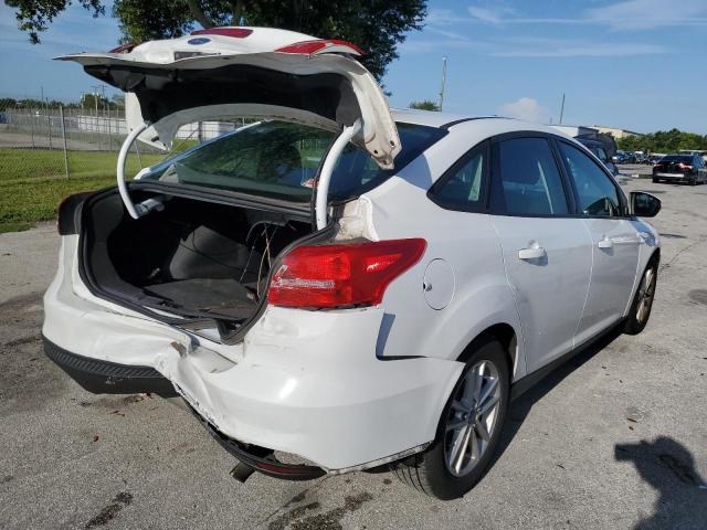 Photo 4 from auction – 2016 FORD FOCUS SE with VIN 1FADP3F27GL212058