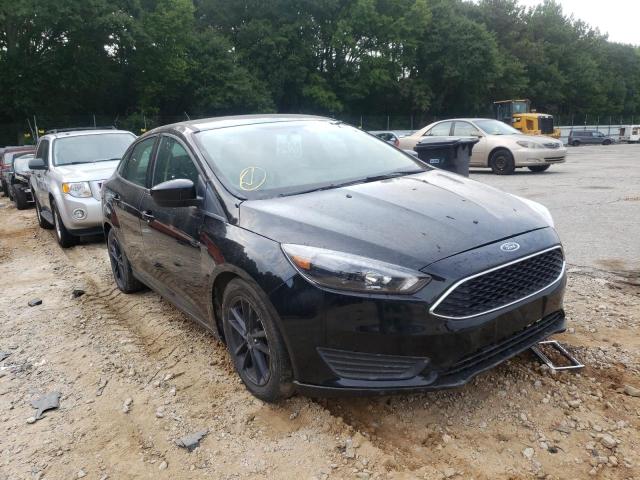 FORD FOCUS SE 2018 with VIN 1FADP3F24JL214910 - Photo from auction