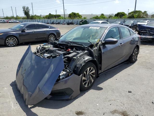 Photo 2 from auction – 2018 HONDA CIVIC EX with VIN 2HGFC2F71JH564482