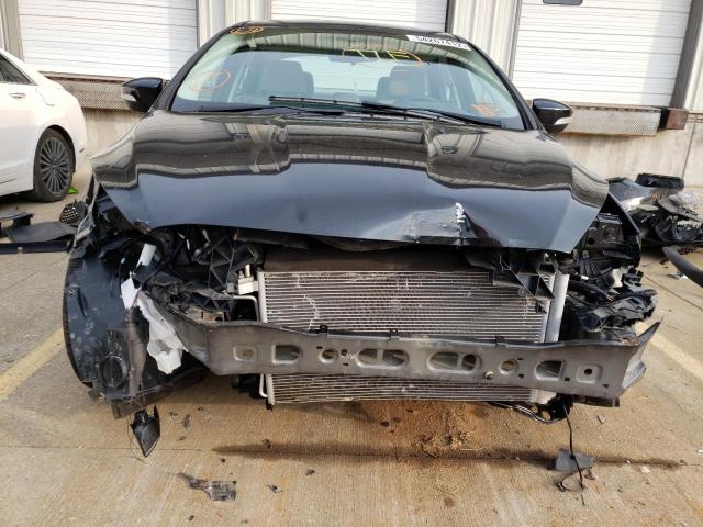 Photo 9 from auction – 2015 FORD FOCUS SE with VIN 1FADP3F22FL305438