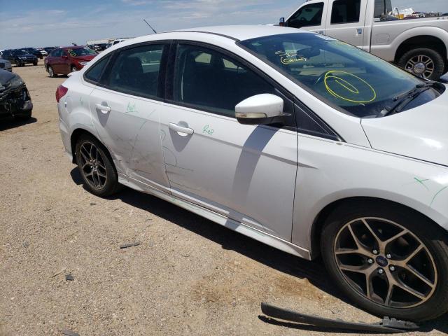 Photo 9 from auction – 2015 FORD FOCUS SE with VIN 1FADP3F29FL273409