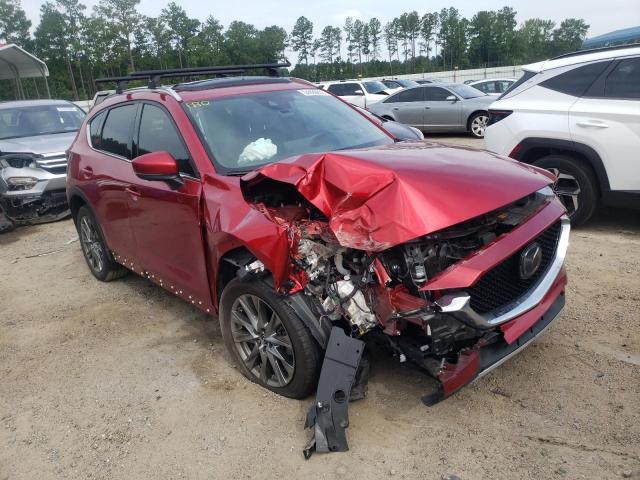 MAZDA CX-5 SIGNA 2021 with VIN JM3KFBEYXM0354610 - Photo from auction