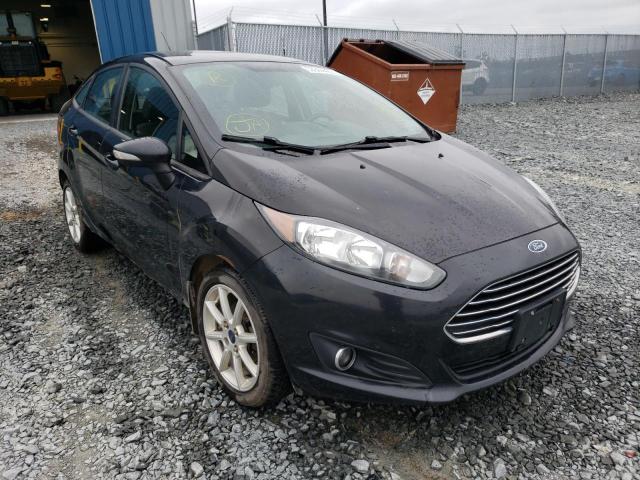 FORD FIESTA SE 2014 with VIN 3FADP4BJ0EM223496 - Photo from auction