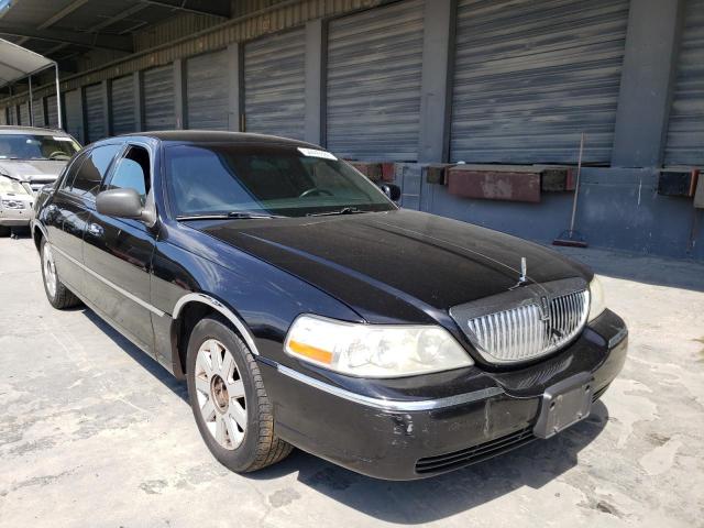 LINCOLN TOWN CAR E 2003 with VIN 1LNHM84W33Y664024 - Photo from auction