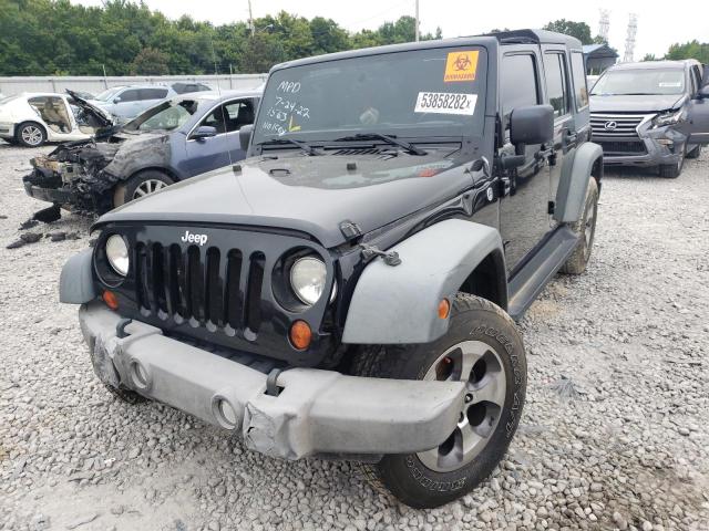 Photo 2 from auction – 2011 JEEP WRANGLER U with VIN 1J4HA3H13BL512054