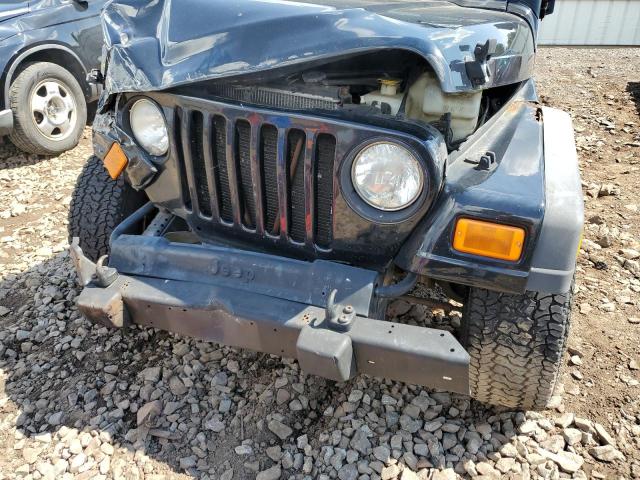 Photo 9 from auction – 2004 JEEP WRANGLER R with VIN 1J4FA39S24P703135