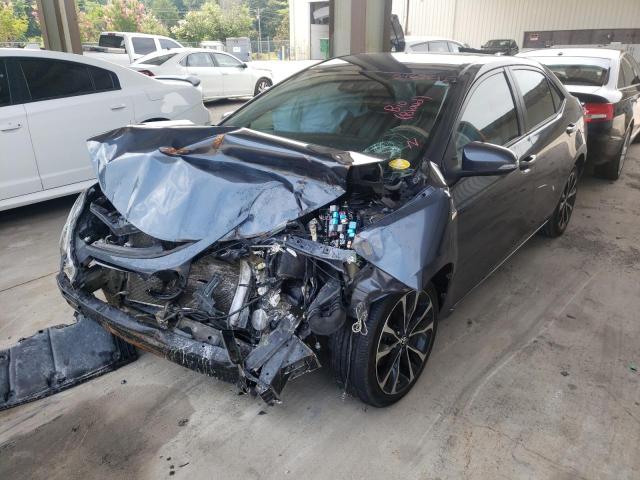 Photo 2 from auction – 2017 TOYOTA COROLLA L with VIN 5YFBURHE3HP581660