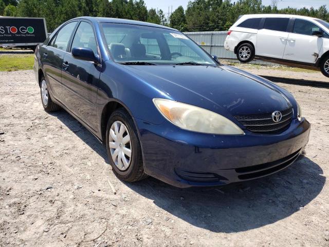 TOYOTA CAMRY LE 2002 with VIN 4T1BE32K12U502016 - Photo from auction