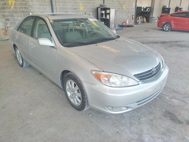 TOYOTA CAMRY LE 2004 with VIN 4T1BF32K24U589215 - Photo from auction