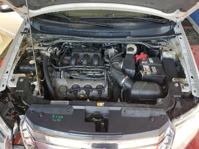 Photo 7 from auction – 2008 FORD TAURUS X L with VIN 1FMDK06W78GA27489