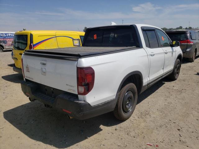 Photo 4 from auction – 2021 HONDA RIDGELINE with VIN 5FPYK3F88MB009779